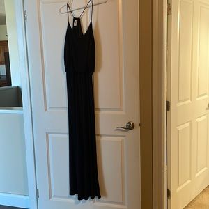 Black jumpsuit wide legged pants spaghetti strap tops